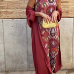 Elegant printed two-piece dress with cape